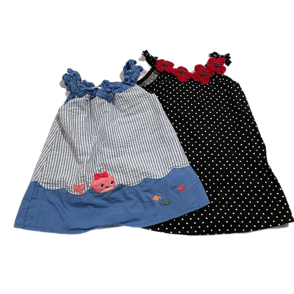 Lot of 2 baby dresses by Gymboree.Blue is 3-6 mo and black is 12-18 months.S17